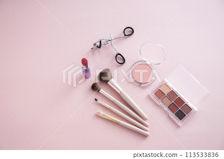 Eyeshadow palette, eyelash curler, makeup brush, lipstick and blush Eyeshadow palette, eyelash curler, makeup brush, lipstick and blush 113533836