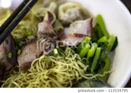 Egg noodle with wonton and red roasted pork. Asian food style. Egg noodle with wonton and red roasted pork. Asian food style. 113534795