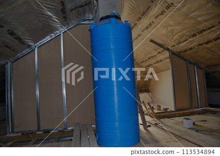 Storage tank for drinking water. A tank for 700 litres of water is located in the attic. 113534894