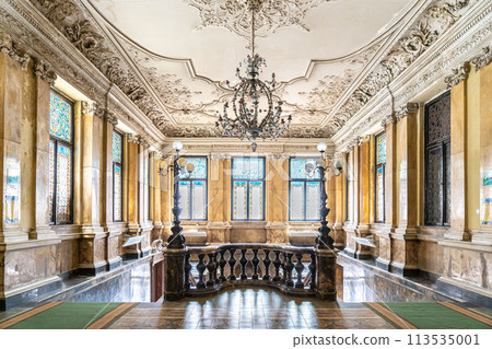 Wooden old decorative balusters, Ancient wooden stairs. decorative railings carved from wood 113535001