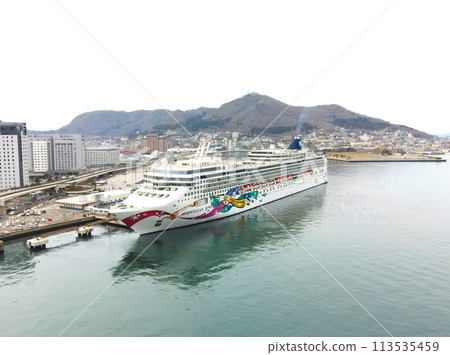 Photographing the cruise ship Norwegian Jewel calling at Hakodate Port in Hakodate, Hokkaido in spring 113535459