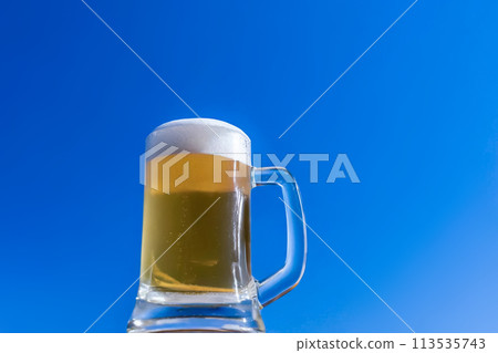 Blue sky and beer mug 113535743