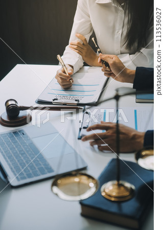 Businessman and Male lawyer or judge consult having team meeting with client, Law and Legal services concept. Businessman and Male lawyer or judge consult having team meeting with client, Law and Legal services concept. 113536027