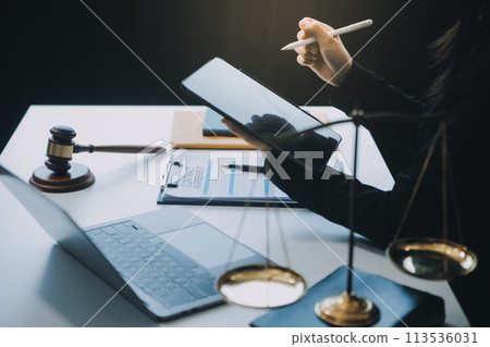 Businessman and Male lawyer or judge consult having team meeting with client, Law and Legal services concept. Businessman and Male lawyer or judge consult having team meeting with client, Law and Legal services concept. 113536031