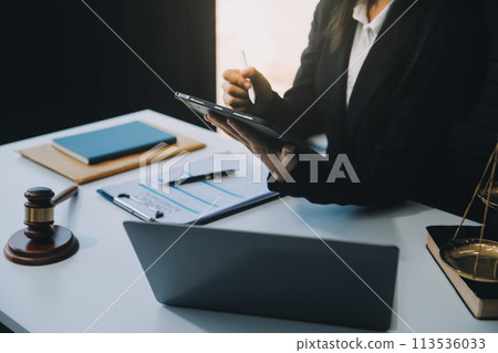 Businessman and Male lawyer or judge consult having team meeting with client, Law and Legal services concept. Businessman and Male lawyer or judge consult having team meeting with client, Law and Legal services concept. 113536033