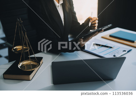 Businessman and Male lawyer or judge consult having team meeting with client, Law and Legal services concept. Businessman and Male lawyer or judge consult having team meeting with client, Law and Legal services concept. 113536036