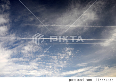 Three contrails in the sky 113537237