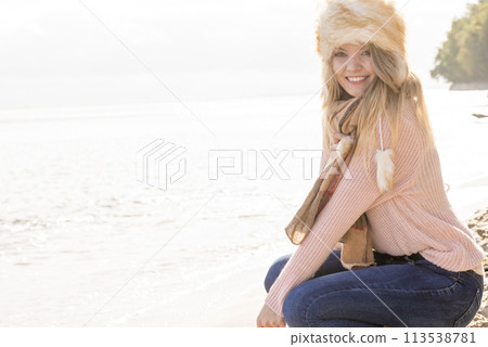 Fashionable woman on beach Fashionable woman on beach 113538781