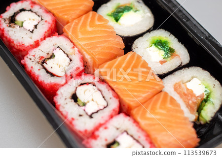 Bright beautiful rolls with fish close up Bright beautiful rolls with fish close up 113539673