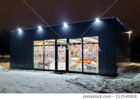 Orenburg, Russia - February 6, 2024 Lonely shop with fruits and vegetables on a cold winter evening Editorial Orenburg, Russia - February 6, 2024 Lonely shop with fruits and vegetables on a cold winter evening Editorial 113540808