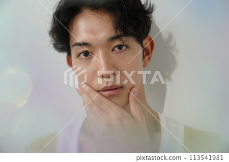 Young man in white tank top 113541981