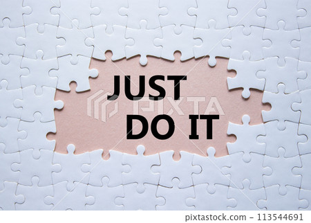 Just do it symbol. Concept words Just do it on white puzzle. Beautiful pink background. Business and Just do it concept. Copy space. Just do it symbol. Concept words Just do it on white puzzle. Beautiful pink background. Business and Just do it concept. Copy space. 113544691