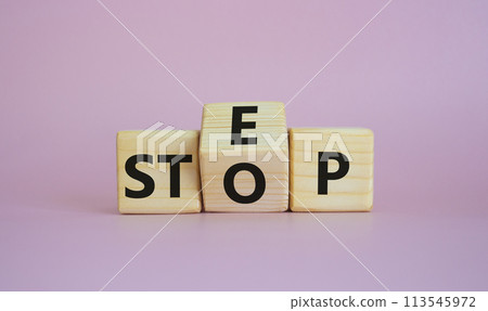 Step vs Stop symbol. Wooden cubes with words Stop and Step. Beautiful pink background. Step vs Stop and business concept. Copy space Step vs Stop symbol. Wooden cubes with words Stop and Step. Beautiful pink background. Step vs Stop and business concept. Copy space 113545972