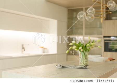 Blurry white modern kitchen interior background Blurry white modern kitchen interior background 113546314