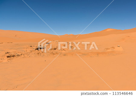 Desert. Dunset in desert. Desert in Dubai. The empty quarter and outdoor sand dune in oman old desert rub al khali. Panoramic. Landscape of golden sand dune with blue sky in Sahara desert. 113546646