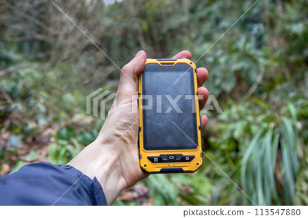 smartphone tracking travel on mountain trails. smartphone tracking travel on mountain trails. 113547880