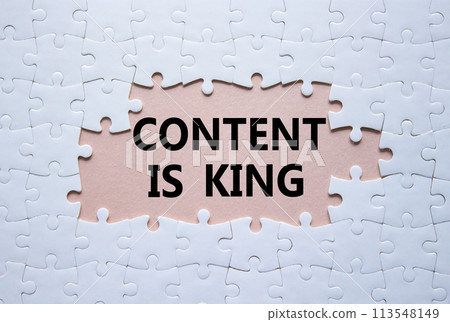 Content is king symbol. Concept words Content is king on white puzzle. Beautiful pink background. Business and Content is king concept. Copy space. Content is king symbol. Concept words Content is king on white puzzle. Beautiful pink background. Business and Content is king concept. Copy space. 113548149