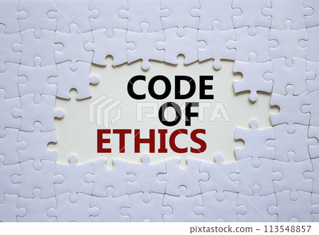 Code of ethics symbol. Concept words Code of ethics on white puzzle. Beautiful white background. Business and Code of ethics concept. Copy space. 113548857