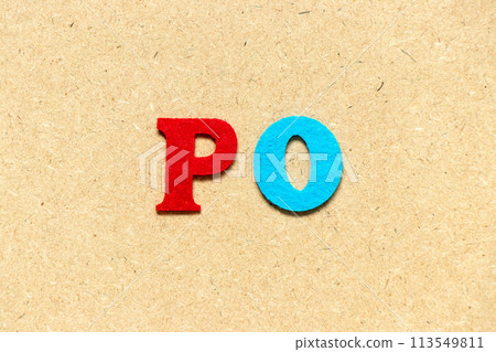 Color cloth alphabet letter in word PO (Abbreviation of purchase order) on wood background 113549811
