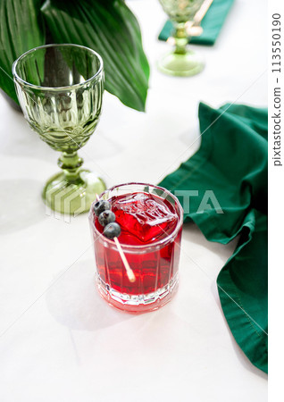 Blackberry cocktail on a light background Blackberry cocktail on a light background 113550190