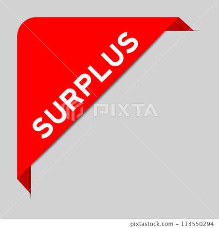 Red color of corner label banner with word surplus on gray background 113550294