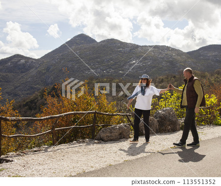 senior friends tourists outdoor adventure together on mediterranian sea close up 113551352