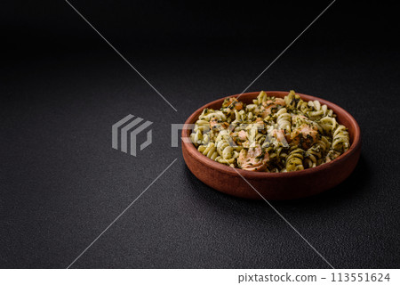 Delicious pasta with spinach, salmon, salt and spices 113551624