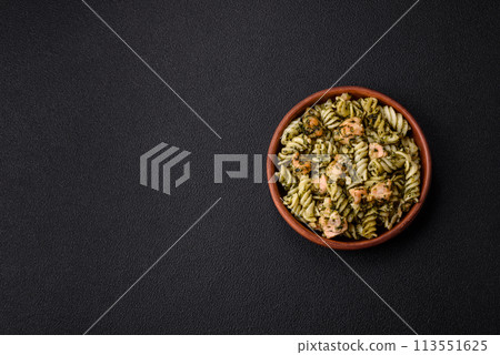 Delicious pasta with spinach, salmon, salt and spices 113551625