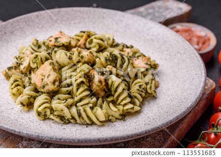 Delicious pasta with spinach, salmon, salt and spices 113551685