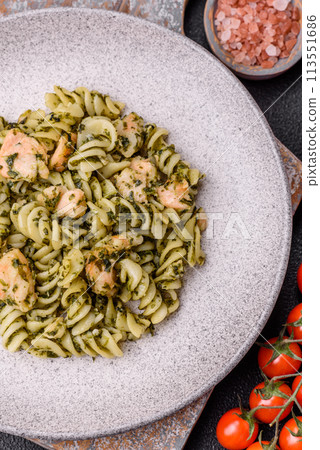 Delicious pasta with spinach, salmon, salt and spices 113551686