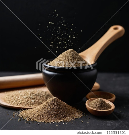 Celery seed powder on a black background. Celery seed powder on a black background. 113551801