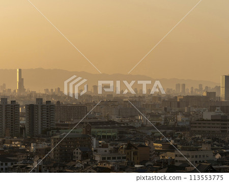 Osaka cityscape covered in yellow sand 113553775