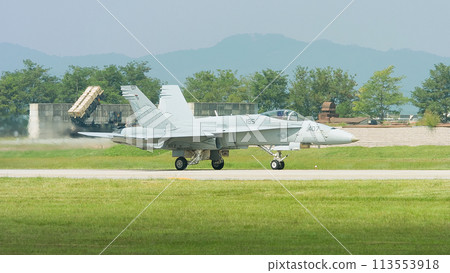 A US Navy F/A-18C Hornet taxiing. A US Navy F/A-18C Hornet taxiing. 113553918