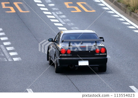 Image of a sports car running on public roads 113554023