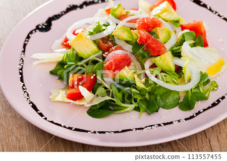 Tasty salad of avocado, grapefruit, tomatoes and corn salad Tasty salad of avocado, grapefruit, tomatoes and corn salad 113557455