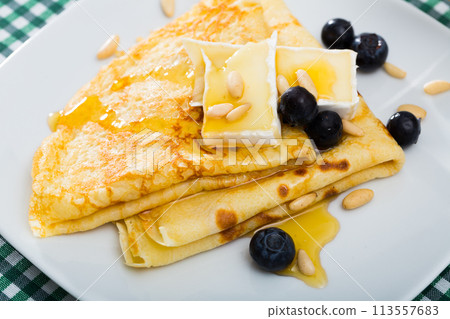 Pancakes with cheese brie and honey Pancakes with cheese brie and honey 113557683