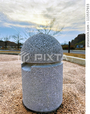 Stone pole and sunset sky 113557933