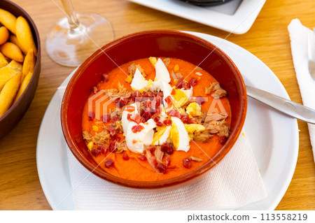 Bowl of cold porra antequerana, Spanish cuisine Bowl of cold porra antequerana, Spanish cuisine 113558219