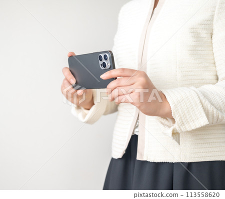 Woman wearing a formal jacket 113558620