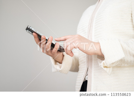 Woman wearing a formal jacket Woman wearing a formal jacket 113558623
