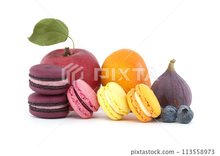 French macaroons and fruits over white background 113558973