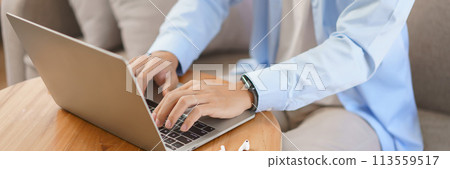 Home office, Businessman typing data on laptop about strategy and planning of new business 113559517