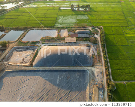 Covered lagoon digester for biogas production from poultry farm. 113559715