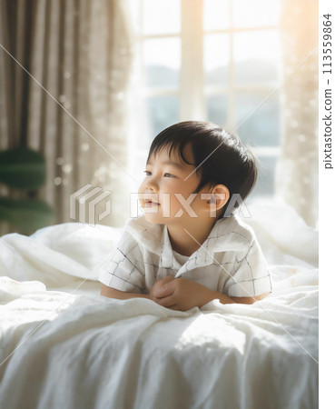 Baby lying on bed 113559864