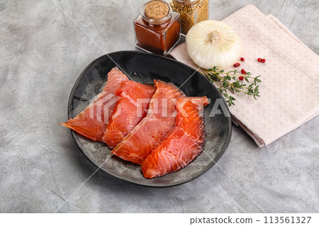 Salted raw salmon fillet appetizer 113561327