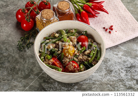 Vegan boiled quinoa with vegetables 113561332
