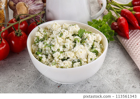 Curd cheese with green herbs 113561343