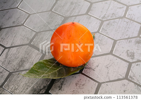 Fresh ripe sweet juicy persimmon Fresh ripe sweet juicy persimmon 113561378