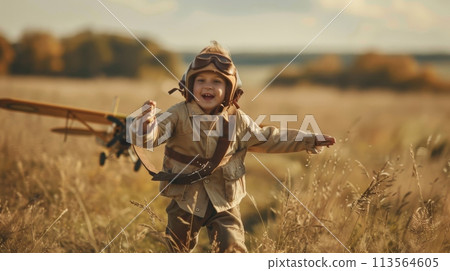 Little Boy Playing With Toy Airplane in Field Little Boy Playing With Toy Airplane in Field 113564605