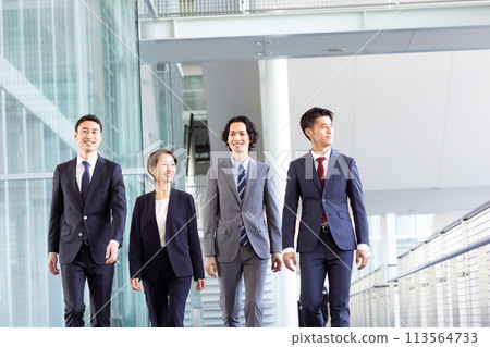 Business person walking 113564733